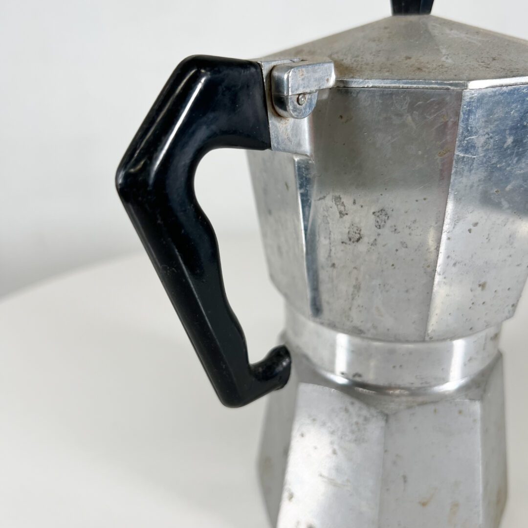 Isolated Vintage Moka Pot On A White Background Standing On A Retro Wooden  Table Mocha Pots Are The Most Used Espresso Coffee Machines In Italy Stock  Photo - Download Image Now - iStock